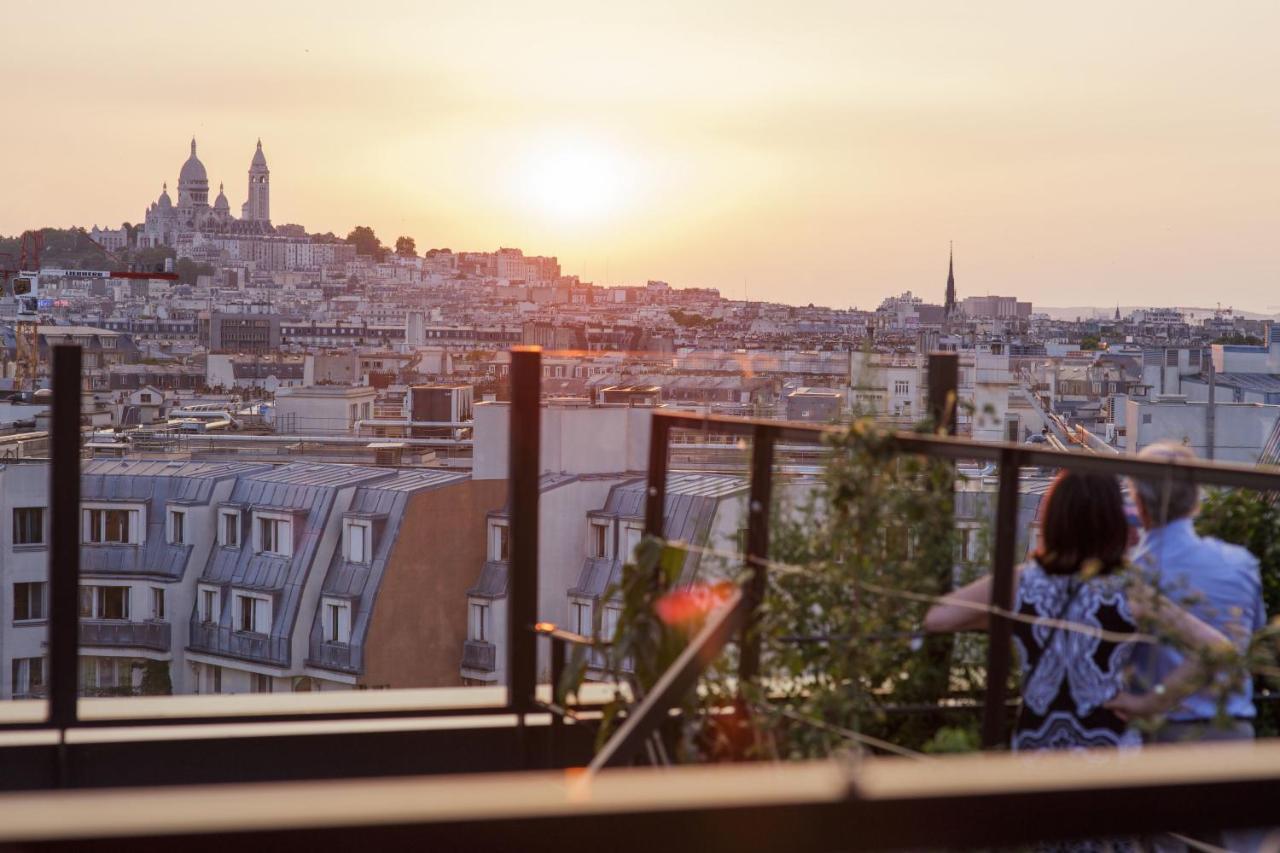 Generator Paris Hostel Exterior photo Rooftop view of the city