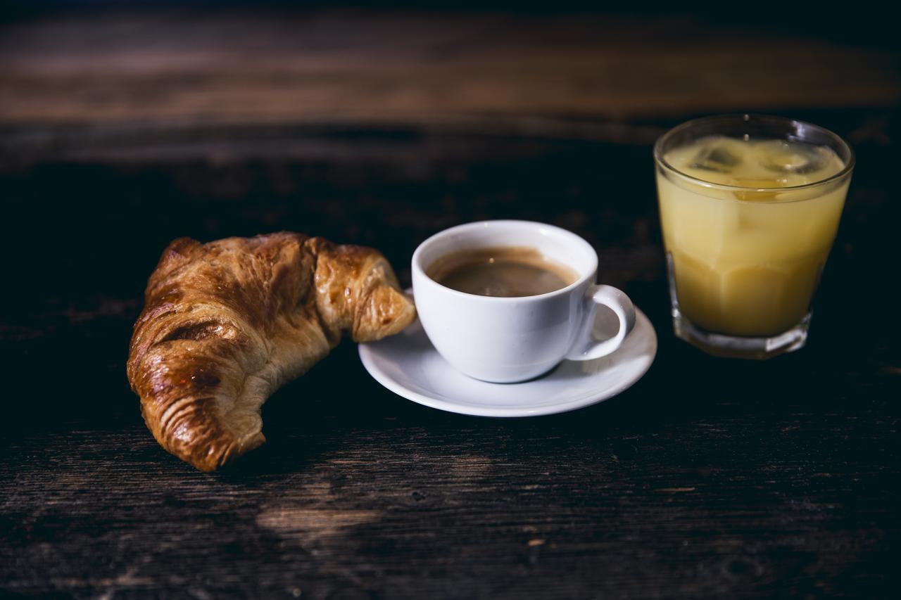 Generator Paris Hostel Exterior photo Croissant and coffee